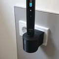 Giá đỡ sạc OralB iO trên ổ cắm Schuko (Chuẩn Đức) - Thumbnail 1