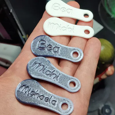 Móc khóa xe đẩy hàng