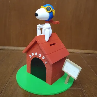 Cỏ và bảng hiệu cho Két Sắt Snoopy vs Red Baron