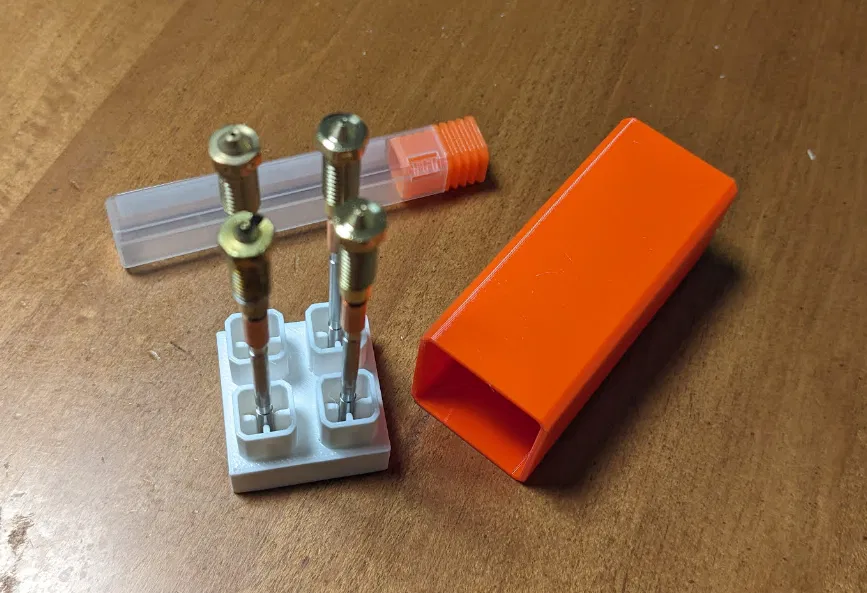 Hộp Đựng Đầu Phun Nextruder - Image 1