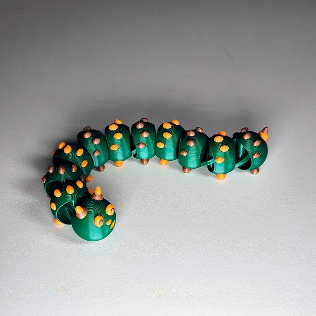 Sâu Bướm Fidget - Image 1