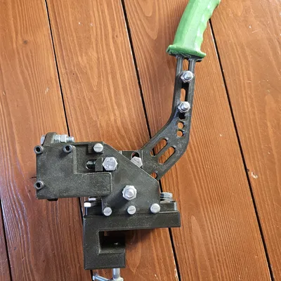 Giá đỡ bàn phanh tay