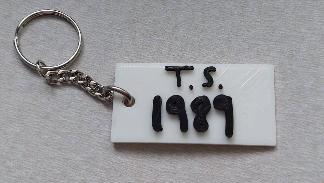 Móc Khóa Taylor Swift Phiên Bản 1989 - Image 1