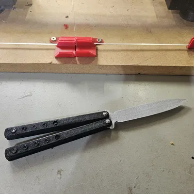 Lưỡi dao Benchmade 62 Balisong với M3 Nuts gắn sẵn