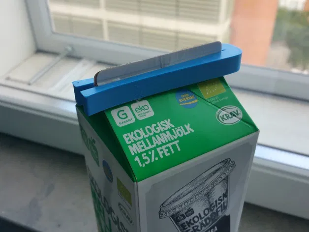 Dụng cụ kẹp/niêm phong hộp Tetra Pak - Image 1