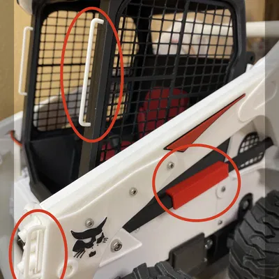 Tay cầm và bảo vệ cho xe xúc lật Bobcat