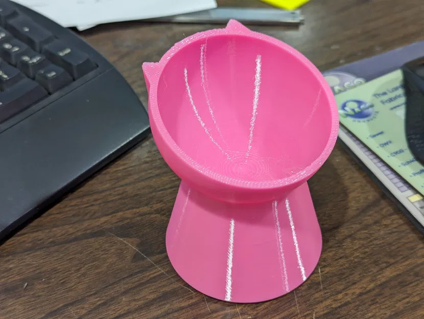 Tô cho mèo đứng có túi đựng tạ đối trọng tích hợp - Image 1