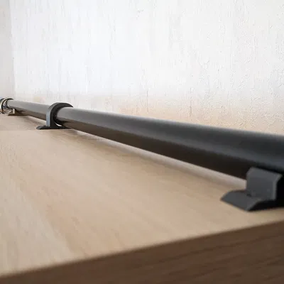 Kệ đỡ thanh treo quần áo