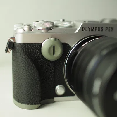 Ốp Tay Cầm và Nắp Vặn Máy Ảnh Olympus Pen-F