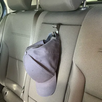 Móc giữ đồ cho bệ tỳ tay gập xe hơi