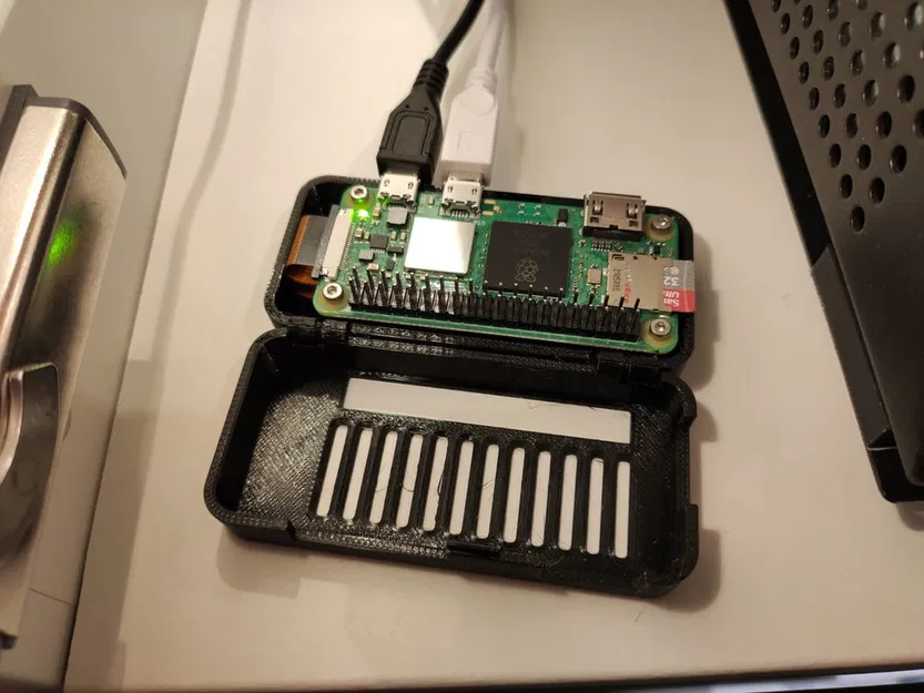 Vỏ và giá đỡ/ giá treo tường khớp nối One Piece cho Raspberry Pi Zero 2 W + Pi Camera - Image 1