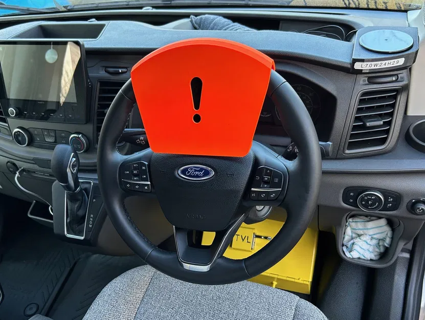 Cảnh báo kẹp bánh xe - Image 1