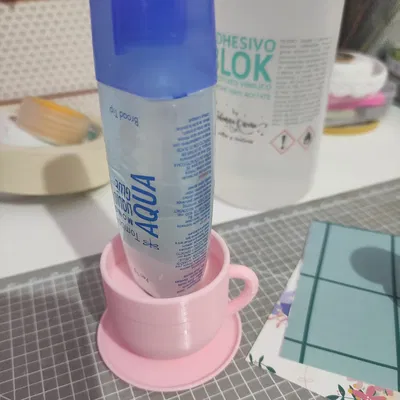 Giá Đỡ Keo Hình Ly