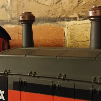 Ống khói bộ giảm tia lửa Harco cho USA Trains NW-2