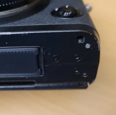 Nắp Che Chân Kết Nối Báng Pin Máy Ảnh Fuji XT-1