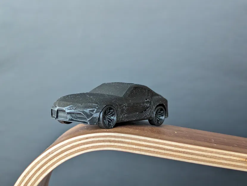 Mô Hình Toyota Supra A90 In Liền Kèm Bánh Xe Quay - Image 2