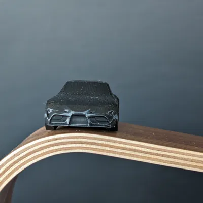 Mô Hình Toyota Supra A90 In Liền Kèm Bánh Xe Quay