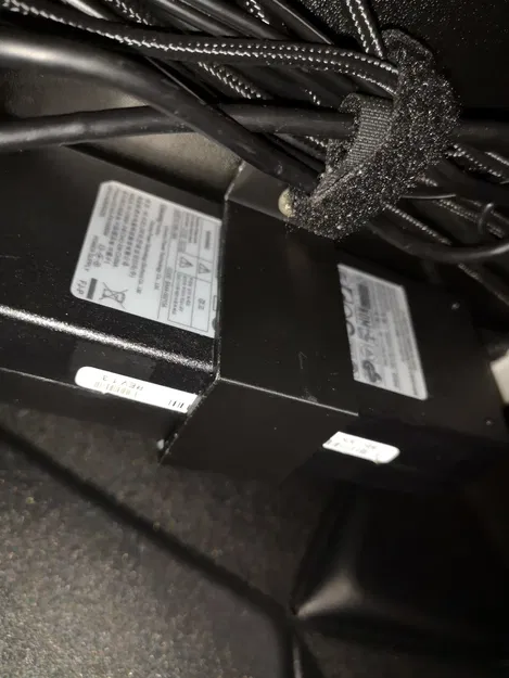 Giá Đỡ Cục Sạc Laptop - Image 1