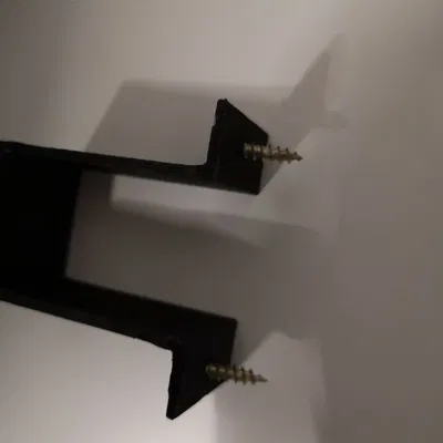 Giá Đỡ Cục Sạc Laptop