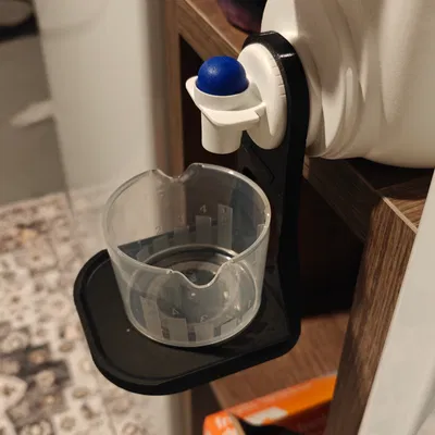 Chai Đựng Nước Giặt Kiêm Giữ Cốc