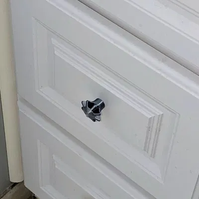 Núm vặn ngăn kéo hoặc tủ, thiết kế 1 và 2