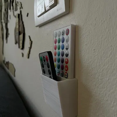 Giá treo remote dán tường