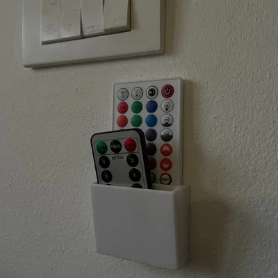 Giá treo remote dán tường