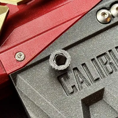 Caliburn C4 (hệ mét) - Nắp che nòng súng và adapter băng đạn ốc vặn