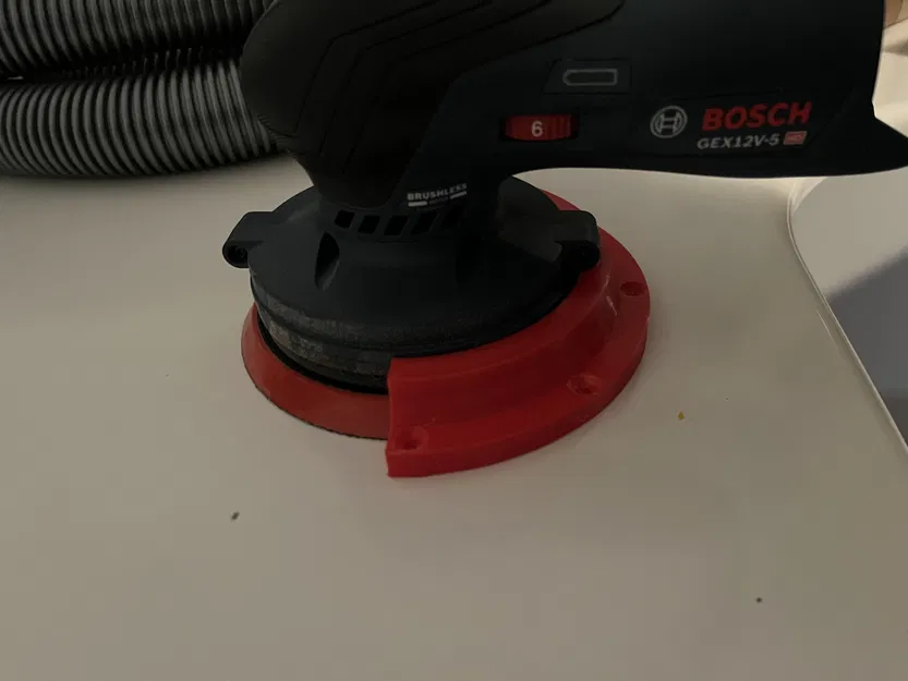 Giá Treo Tường Máy Chà Nhám Bosch GEX12v-125 5 inch - Image 1