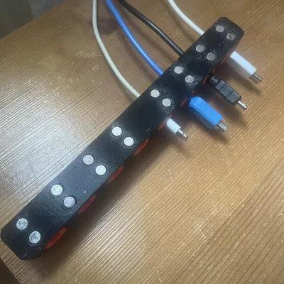 Giá đỡ cáp nam châm