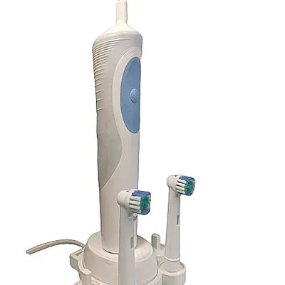 Chân đế Oral-B (sạc+4 đầu bàn chải)