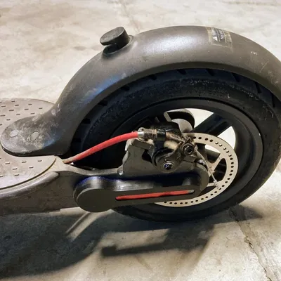 Giá đỡ "AirTag" / mili mittag Khỉ Bạc Tàng Hình cho xe Xiaomi M365