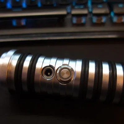 Nút Bịt Cổng Sạc Thanh Kiếm Ánh Sáng