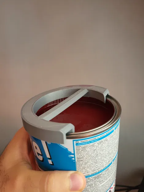 Dụng cụ gạt cọ sơn cho lon sơn - Image 1