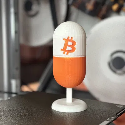 Tượng Bitcoin Cam Viên Thuốc