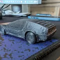 Mô hình Delorean DMC-12 in liền với bánh xe chạy được - Thumbnail 1