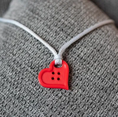 Mặt dây chuyền - Nút áo may mắn