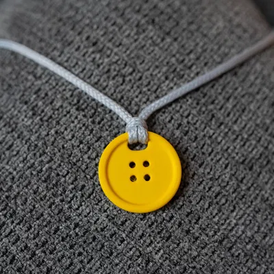 Mặt dây chuyền - Nút áo may mắn