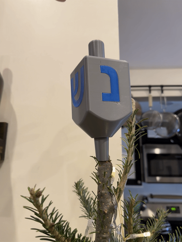 Chóp Cây Thông Noel Dreidel Quay - Image 1