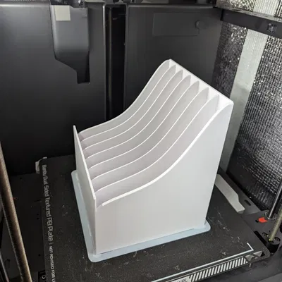 Hộp đựng túi thực phẩm (Retort, MRE, thức ăn cho mèo, v.v.). Thiết kế cong giúp túi trượt vào dễ dàng