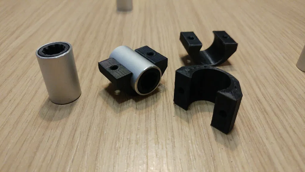 Prusa i3 MK3: Kẹp bạc đạn cho trục Y (bàn in) - Image 1