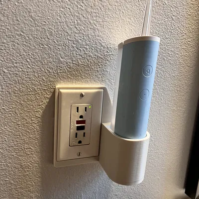 Nắp Ổ Điện Treo Máy Tăm Nước Nhà Tắm