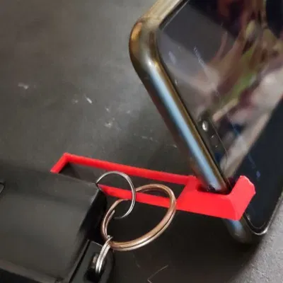 Móc Khóa Kiêm Đế Đựng Điện Thoại