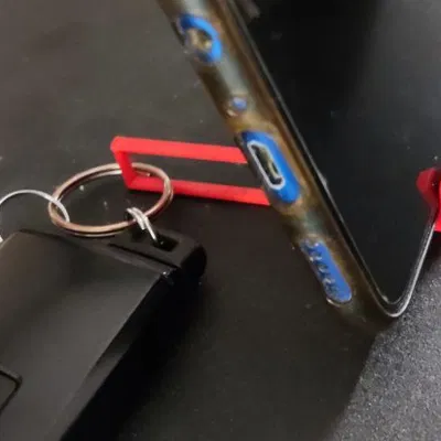 Móc Khóa Kiêm Đế Đựng Điện Thoại