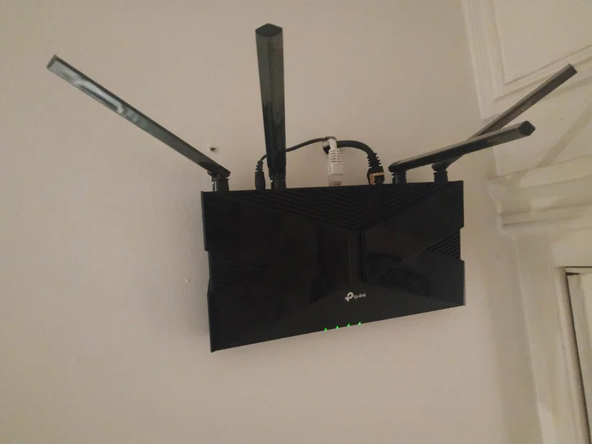 TP Link AX58 Ngàm Treo Tường Nằm Ngang - Image 1