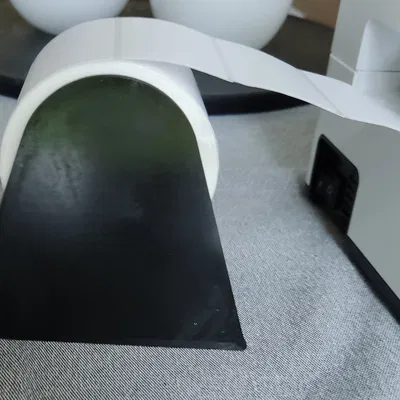 Giá đỡ cuộn nhãn