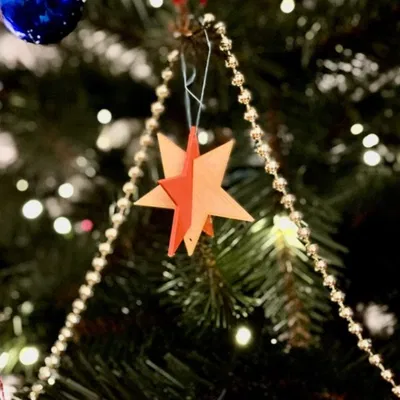 Ngôi Sao Giáng Sinh Lấp Lánh Xoay Vòng Twinkle Twirl