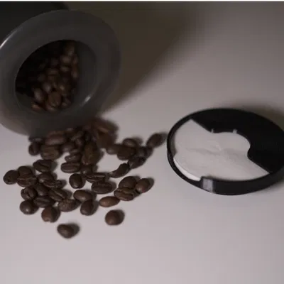 Nắp du lịch Aeropress có chỗ giữ lọc