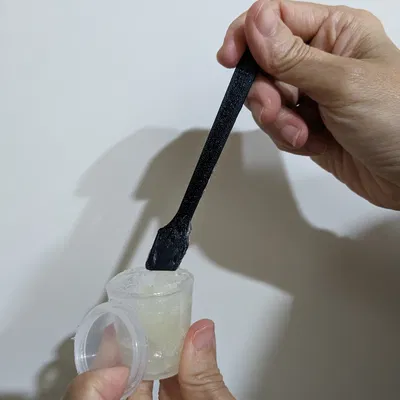 Cái muỗng dẹp để múc mỡ