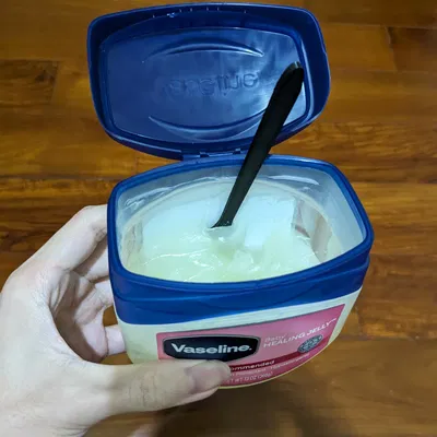 Cái muỗng dẹp để múc mỡ